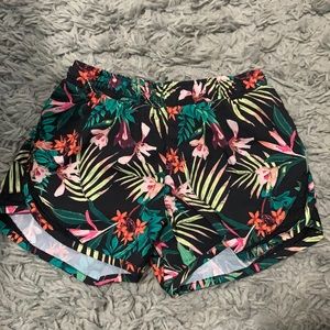 Selling an Old Navy tropical shorts with elastic waste also has built-in shorts
